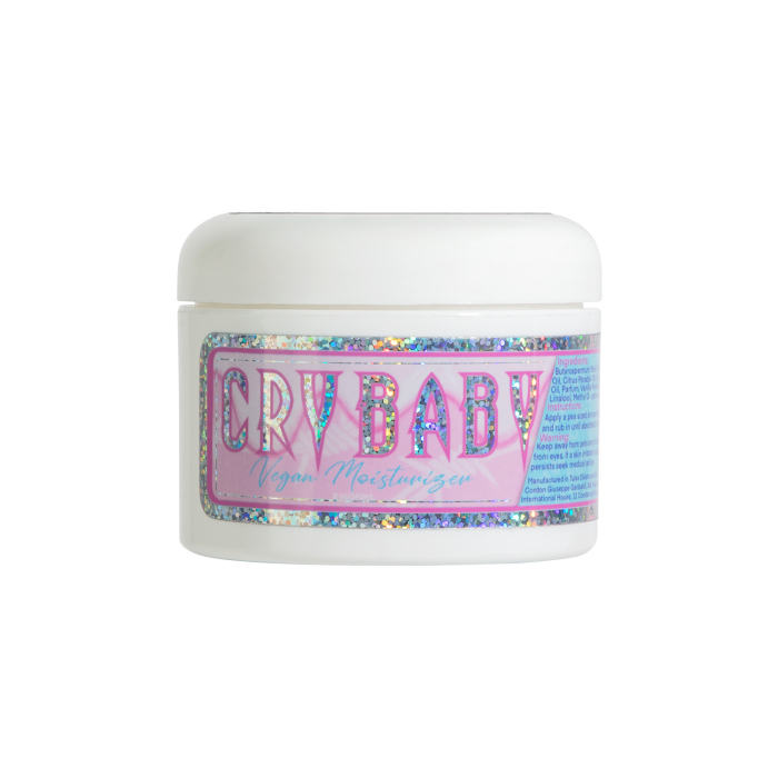 Un pot blanc étiqueté Crybaby - Glide 240 ml, avec un motif coloré et irisé sur le devant, placé sur un fond dégradé bleu-rose.